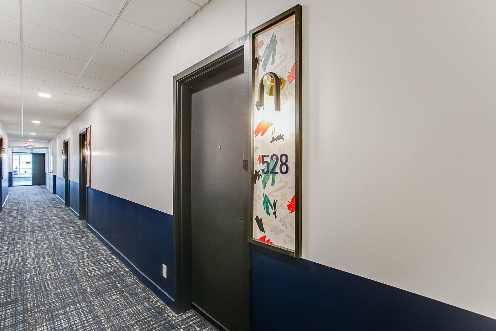 the midline apartments unit 528 door from the hallway