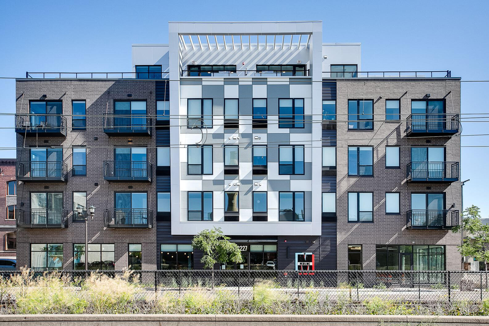 the front of the midline apartments building